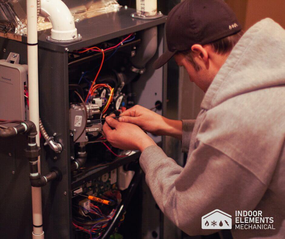 Furnace Repair Technician at work